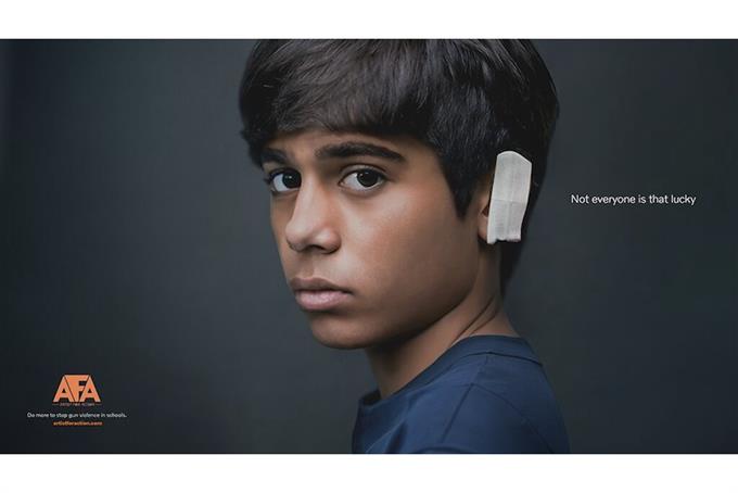 Child with bandage on ear