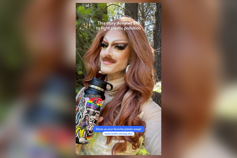 Drag queen performer Pattie Gonia holding a Blueland cup on an Instagram Reel