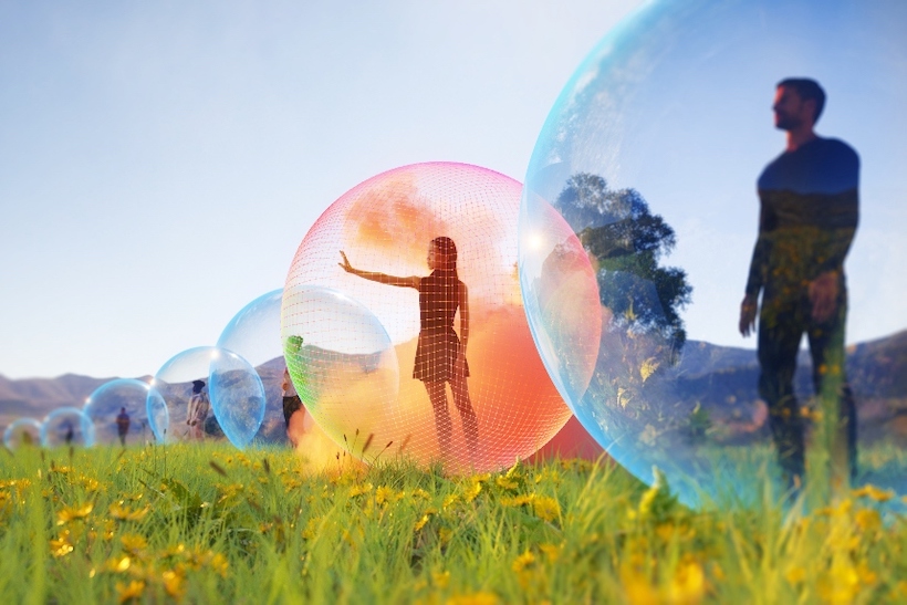 Group of people standing inside CGI spheres