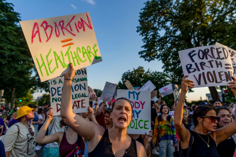 Abortion rights supporters holding signs