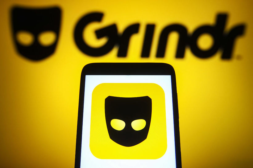 Smart phone displaying Grindr logo