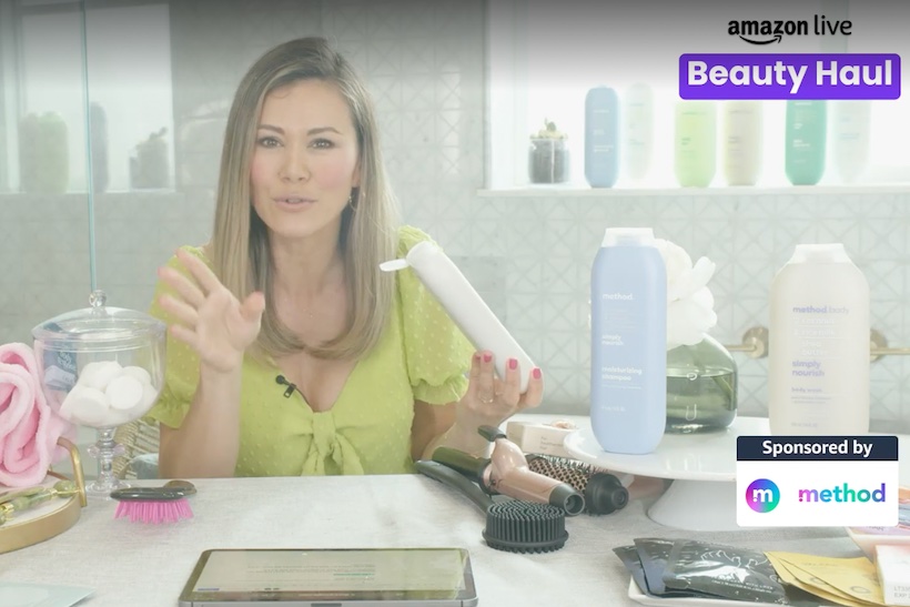 Woman with beauty products on Amazon livestream