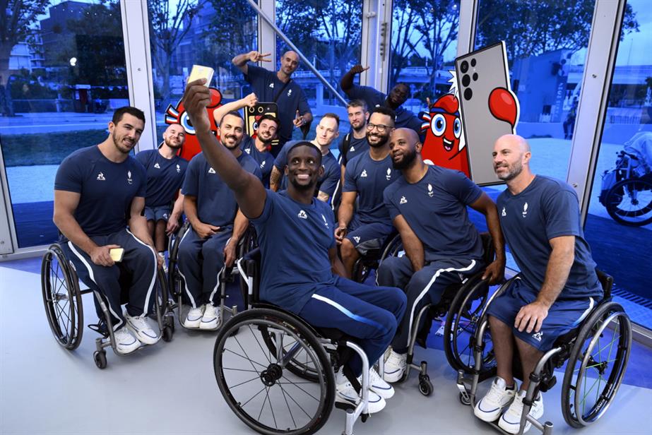 Samsung Paralympics campaign -  Wheelchair Basketball players from Team France share a group selfie after picking up their Samsung Galaxy Z Flip6 Olympic Edition at the Samsung experience pop-up space at the Olympic and Paralympic Village.