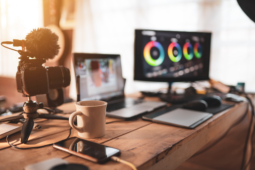 Stock art of an influencer's desktop with streaming setup