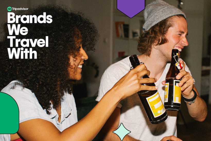 Tripadvisor ad showing two people holding beverage bottles