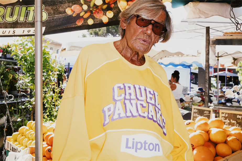 A man wearing a yellow jumper from the cruel pancake/lipton collection